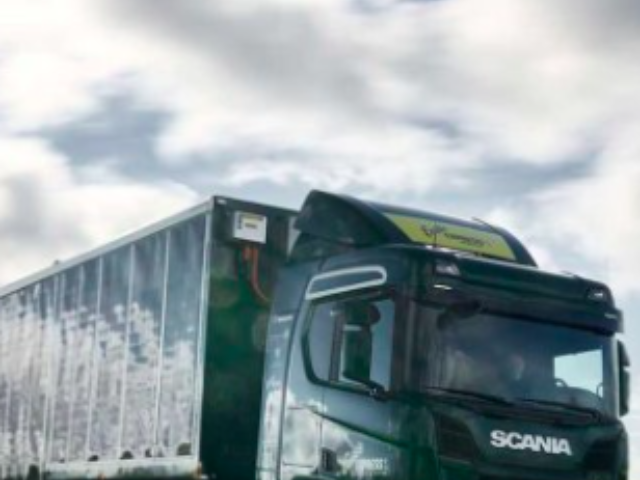 An image of Scania's solar truck, symbolizing the future of sustainable freight with its sleek design and solar panels, reflecting innovation in clean and green transportation