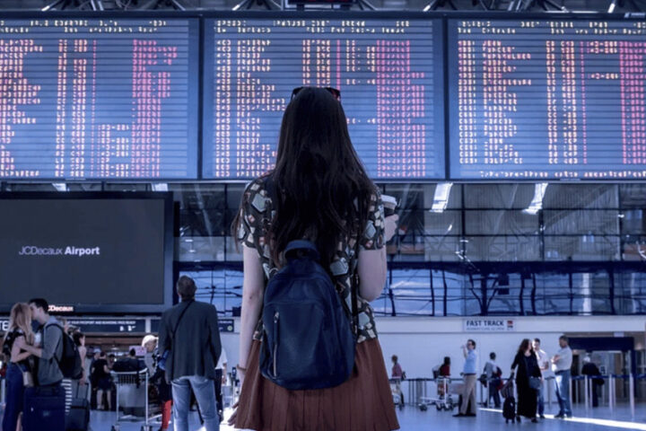 Woman at airport. Source Wikipedia Commons