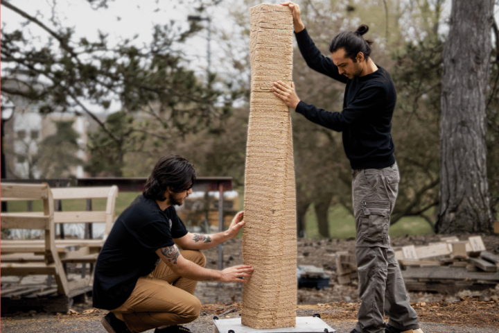 Zachary Keller and Muhammad Dayyem Khan of the Digital Architecture Research & Technology Laboratory work with robotic 3D-printed, wood-based material paired with incremental set-on-demand concret