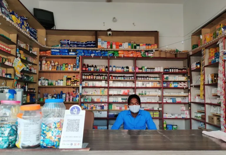 A Person Sitting in a Medicine Shop