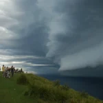 People witness the coming of storm