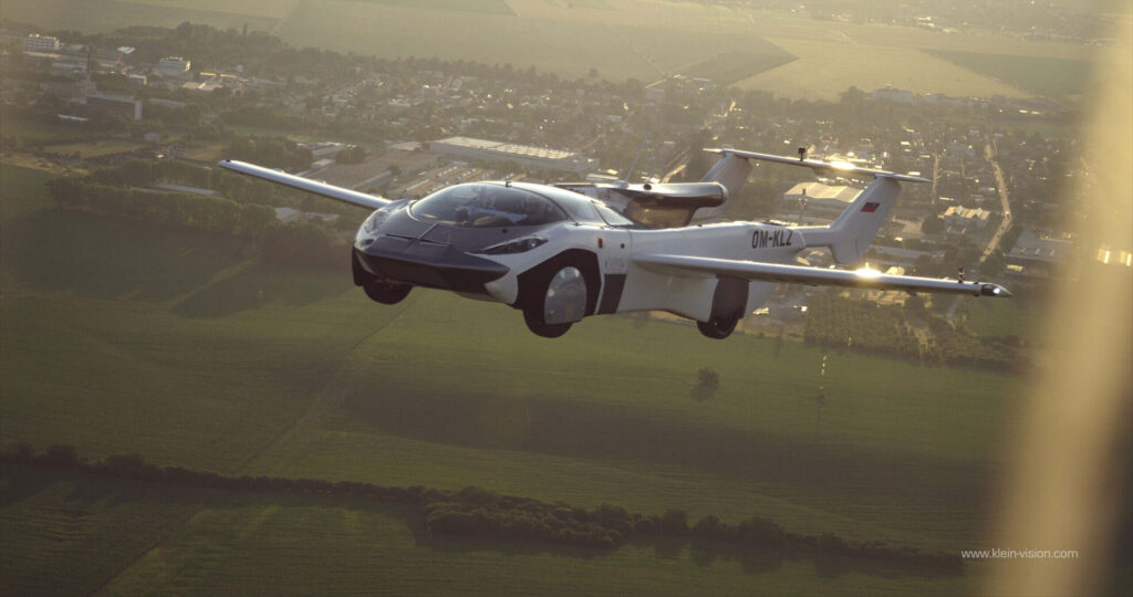 A flying car is seen in the picture soaring above a farm.(Source: Klein Vision)