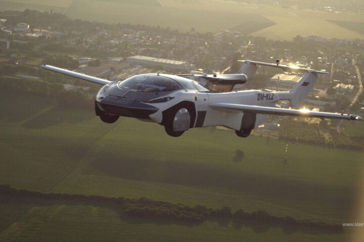 A flying car is seen in the picture soaring above a farm.(Source: Klein Vision)