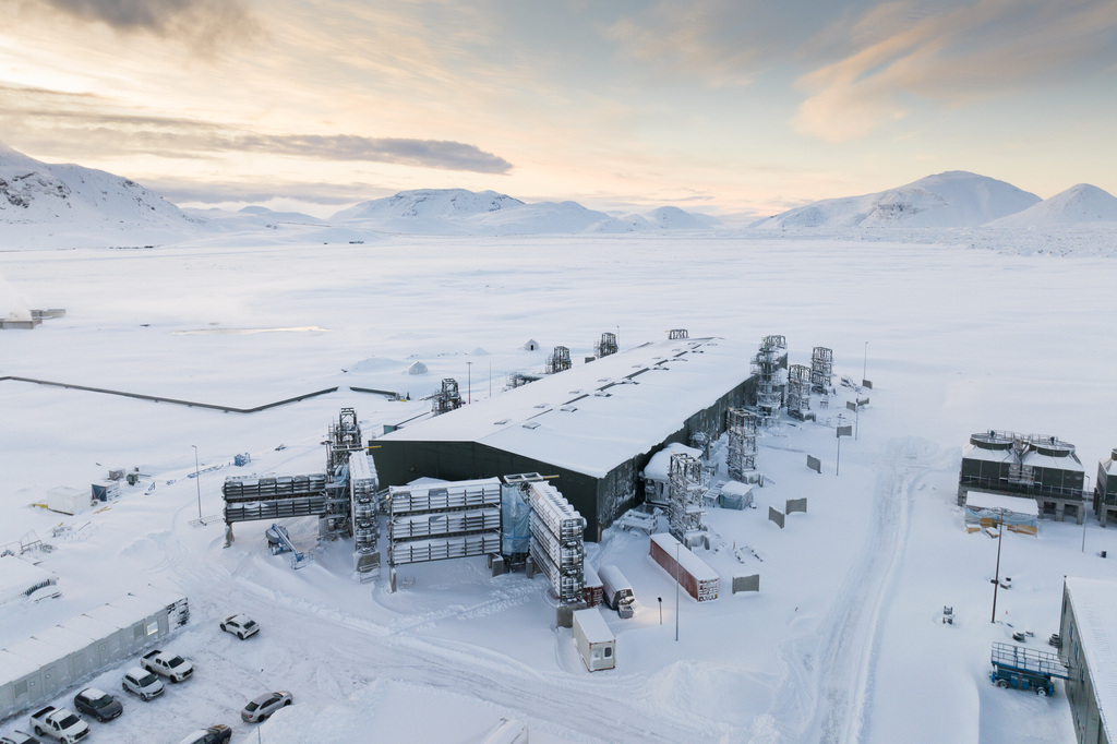 A snow-covered ski resort with a wintry scene of mountains and ski runs. The view shows a chilly, wintry landscape with clouds in the sky.(Source: prowlypro)