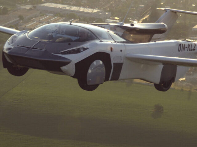 A flying car is seen in the picture soaring above a farm.(Source: Klein Vision)