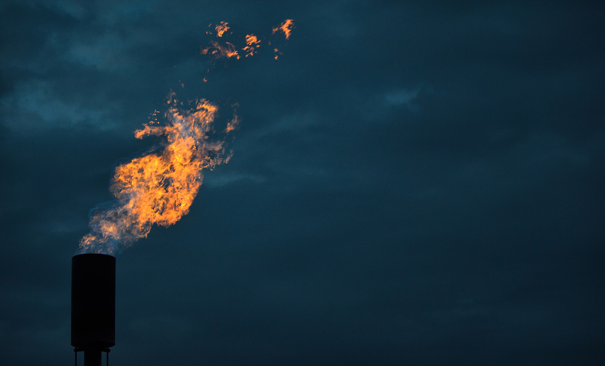 Methane burns from a flaring unit at a solid waste landfill.