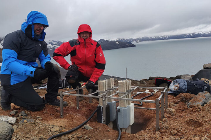 Miguel Araiz (left) and David Astrain, next to one of the geothermal thermoelectric generators, which harness the Earth's heat to generate electricity.