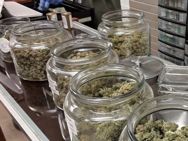 A variety of strains at a recreational marijuana dispensary in Denver, Colorado. Photo Credit: My 420 Tours (CC BY-SA 4.0 DEED)