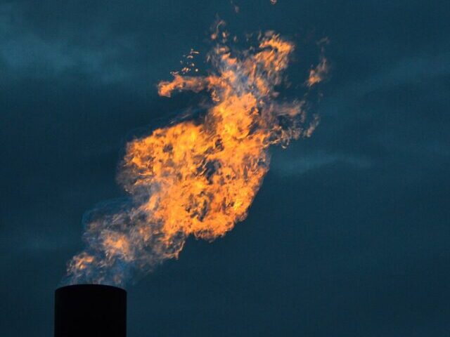 Methane burns from a flaring unit at a solid waste landfill.