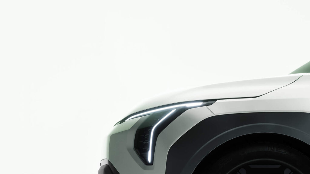 Kia EV3 is teased with a robust 400 km range, ready for its global debut. Discover what sets this compact electric SUV apart from the crowd