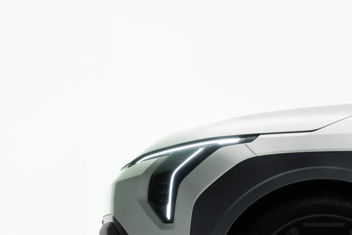 Kia EV3 is teased with a robust 400 km range, ready for its global debut. Discover what sets this compact electric SUV apart from the crowd