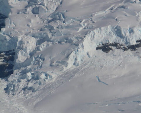 The region beneath an ice sheet where the ground-based ice meets the sea is known as the grounding zone.