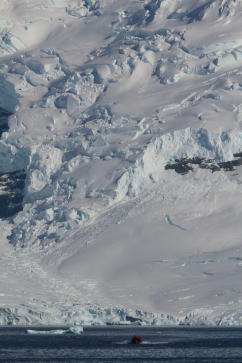 The region beneath an ice sheet where the ground-based ice meets the sea is known as the grounding zone.