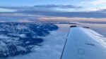 An instrumented Mooney research aircraft passes over the Northern Rocky Mountains in Montana during NOAA’s 2023 NOGAP aerial mission to capture atmospheric profiles of greenhouse gases in a series of flights across the United States. Photo Credits: Anna McAuliffe/CIRES