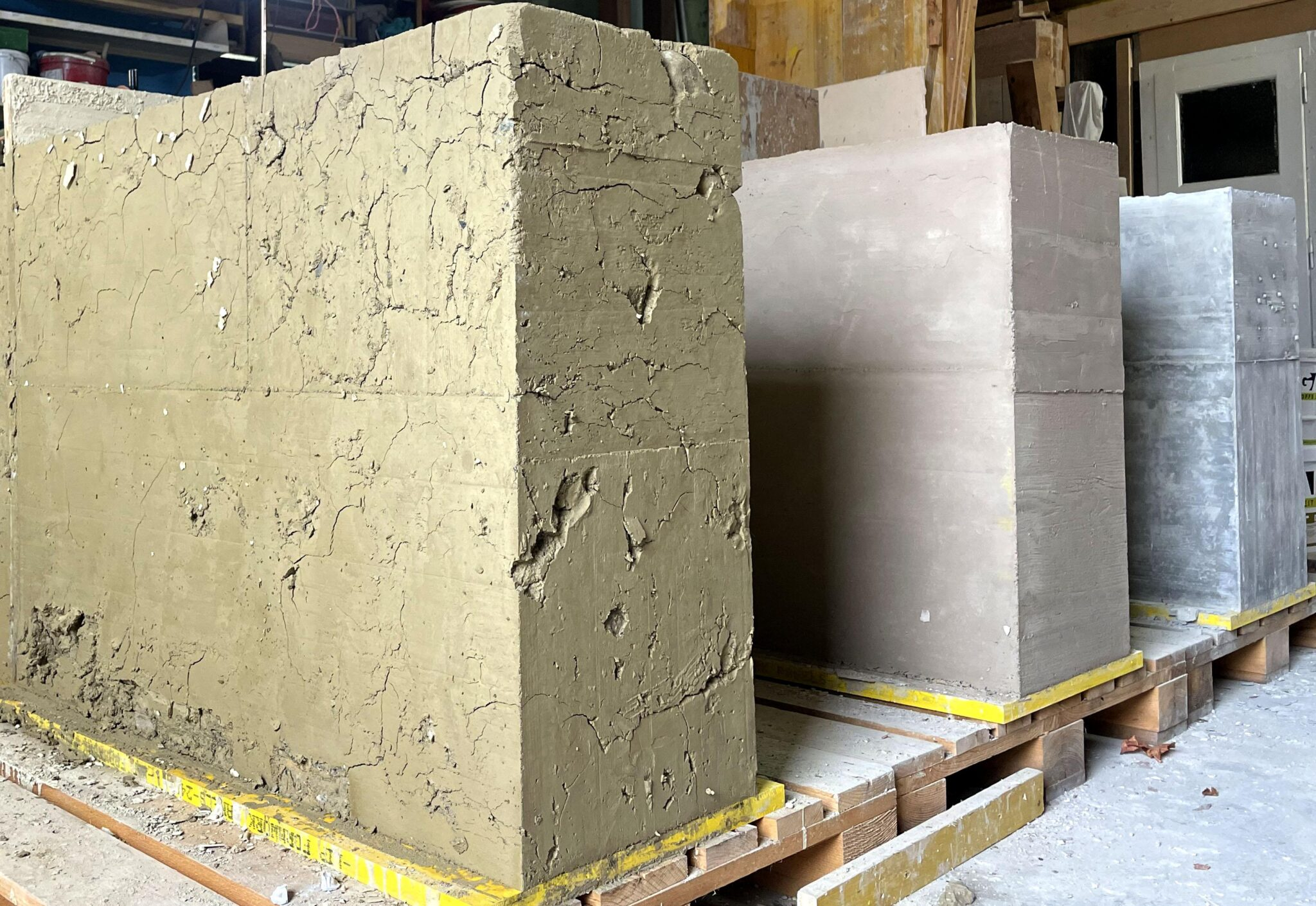 Prototype walls made with a clay, lime and cement. © 2023 EPFL / Salvatore Aprea