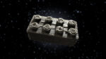 A LEGO-style ESA space brick, 3D-printed using dust from a meteorite.