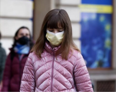 A Little girl with face mask.