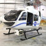 The NASA Airborne Instrumentation for Real-world Video of Urban Environments (AIRVUE) sensor pod is attached to the base of a NASA helicopter at NASA’s Kennedy Space Center in Florida in April 2024 before a flight to test the pod’s cameras and sensors. The AIRVUE pod will be used to collect data for autonomous aircraft like air taxis, drones, or other Advanced Air Mobility aircraft.