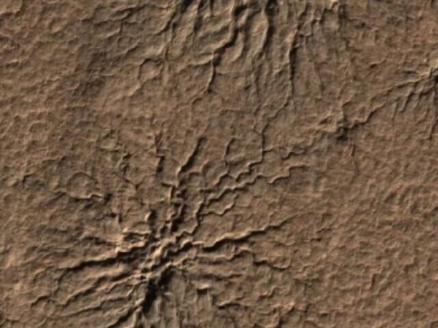 Tests on Earth appear to confirm how the Red Planet’s spider-shaped geologic formations are carved by carbon dioxide.