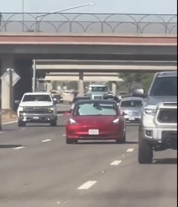 Tesla Model 3 Spotted Driving with Windshield Covered