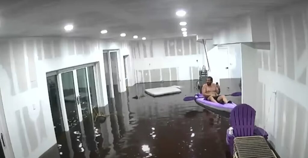 Florida man kayaks in his living room during Hurricane Helene.