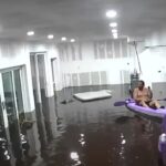 Florida man kayaks in his living room during Hurricane Helene.