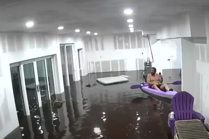 Florida man kayaks in his living room during Hurricane Helene.