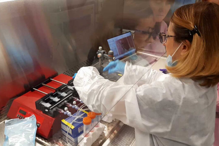 Maddalena Parafati at Kennedy Space Center preparing the programmable syringe pumps that dispense the culture media at fixed reproducible flow rates into the tissue chips.