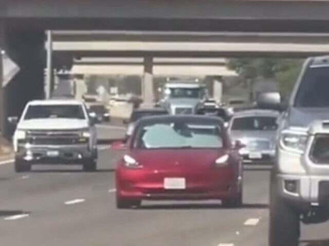 Tesla Model 3 Spotted Driving with Windshield Covered