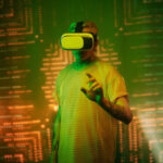 Representative Image. Man in Yellow Shirt Wearing White and Black VR Goggles,