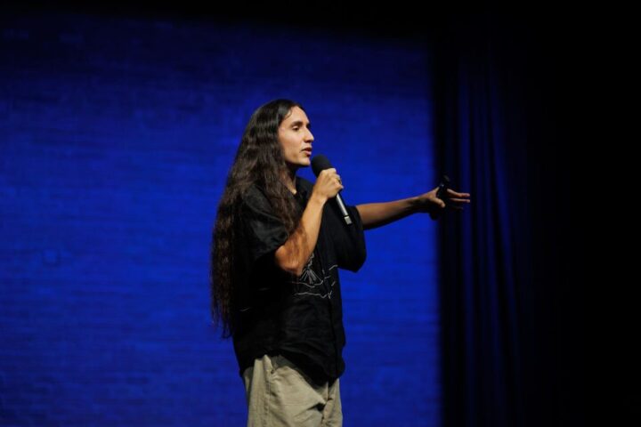 Activist and musician Xiuhtezcatl Martinez speaks during the Latino and Sustainability Cultural Dinner.