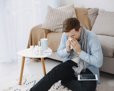 Representative Image. A sick person wiping his nose with tissue. Photo Source: Gustavo Fring (Pexels)