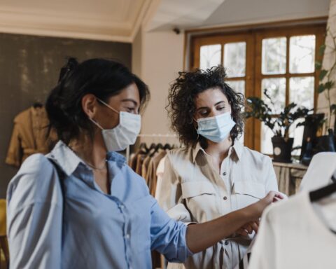 Representative Image. Woman in Blue Button Up Shirt Wearing Face Mask. Photo Source: Arina Krasnikova (Pexels)