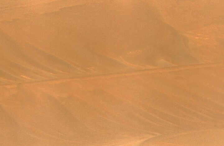 NASA’s Ingenuity Mars Helicopter, right, stands near the apex of a sand ripple in an image taken by Perseverance on Feb. 24, 2024, about five weeks after the rotorcraft’s final flight. Part of one of Ingenuity’s rotor blades lies on the surface about 49 feet (15 meters) west of helicopter (at left in image). Credit: NASA/JPL-Caltech/LANL/CNES/CNRS