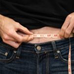 Representative Image. Weight Loss - Man measuring waist. Photo Source: Click 2 Pharmacy