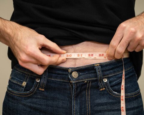 Representative Image. Weight Loss - Man measuring waist. Photo Source: Click 2 Pharmacy