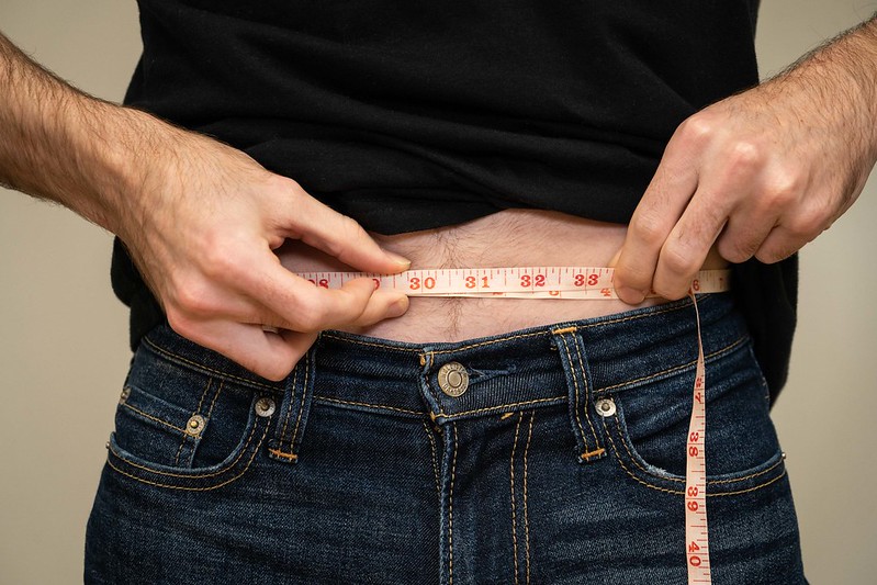 Representative Image. Weight Loss - Man measuring waist. Photo Source: Click 2 Pharmacy