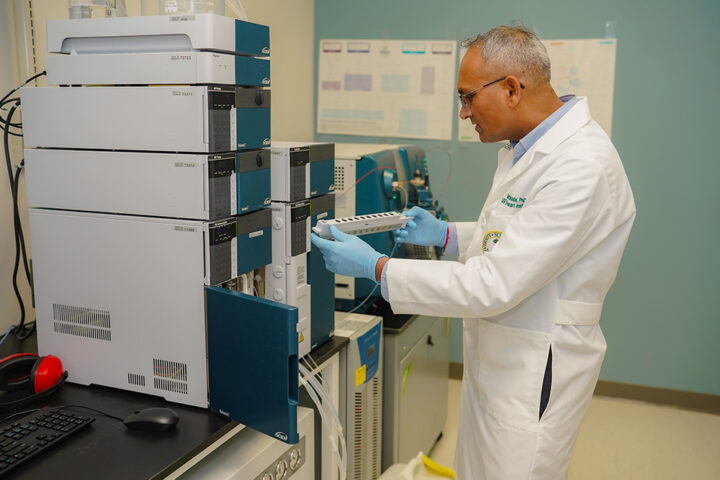 Ganesh Halade in his lab using a highly sensitive analytical technique to detect trace amounts of lipids in 162 tumor samples from TGH Cancer Institute | Photo by: Ryan Rossy