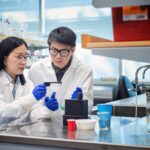 Dr. Tianxi Yang and student Peter Yang. Photo credit: Martin Dee.