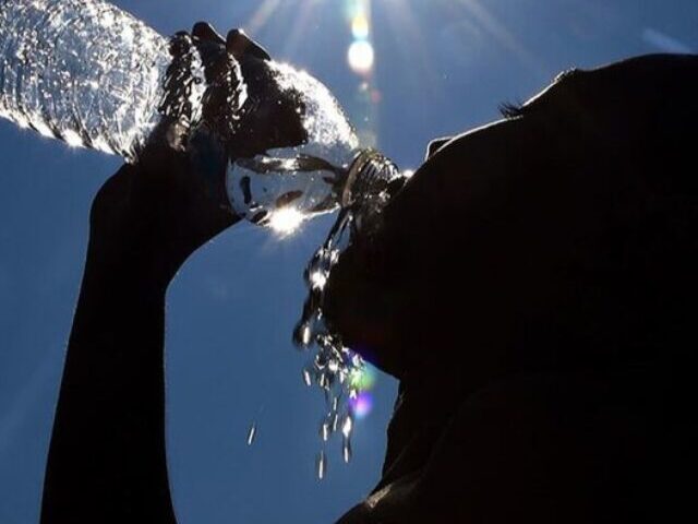 Representative Image. Summer weather can be unpredictable. Increasing water intake can help people avoid heat exhaustion when working or playing outdoors. Photo Source: Roland Schedel (U.S Army)