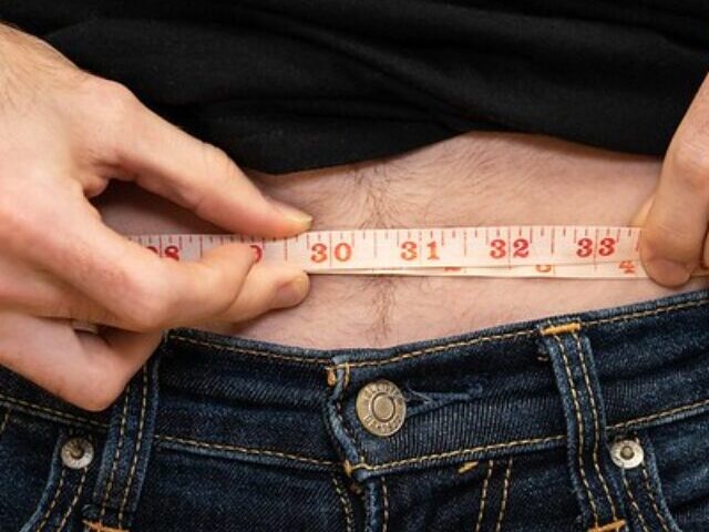 Representative Image. Weight Loss - Man measuring waist. Photo Source: Click 2 Pharmacy