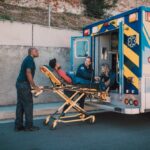 Paramedics Bringing Man in a Ambulance Photo Source: RDNE stock images (pexels)