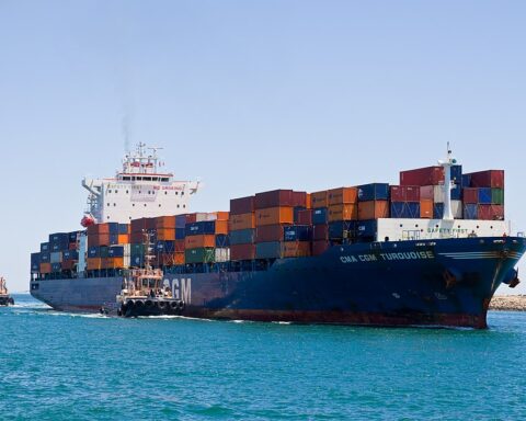 Representative Image. Container ship transporting cargo in harbor.. Photo Source: Gnangarra (CC BY 2.5 AU)