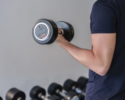 Representative Image. A Person is doing exercise with Dumbell. Photo Source: Engin_Akyurt (Pixabay)