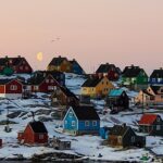 Representative image. Sunset In a Greenland Village. Photo Source: seth7225 (Pixabay)