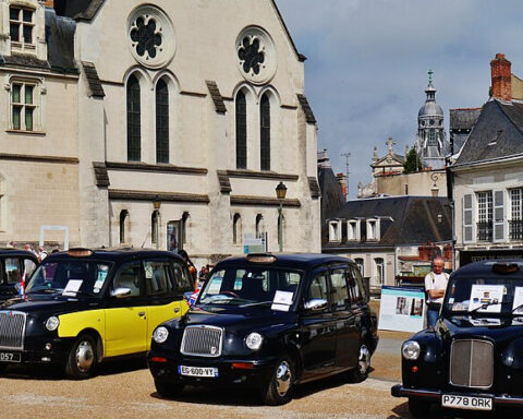 London Cabs in Front of Blois Castle, Blois, Department of Loir-et-Cher, Region of Centre-Loire Valley, France