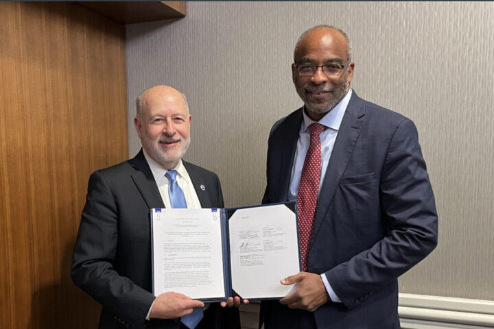 Dr. Rick Spinrad, NOAA administrator (left), and Dr. Everette Joseph, Director of the National Center for Atmospheric Research, hold up an expanded Memorandum of Understanding on December 10, 2024 in Washington DC. The MOU will strengthen the partnership between NOAA and NCAR to advance and accelerate our understanding and application of Earth system science. (Photo Source: NOAA)