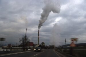 Smoggy cityscape with industrial pollution.