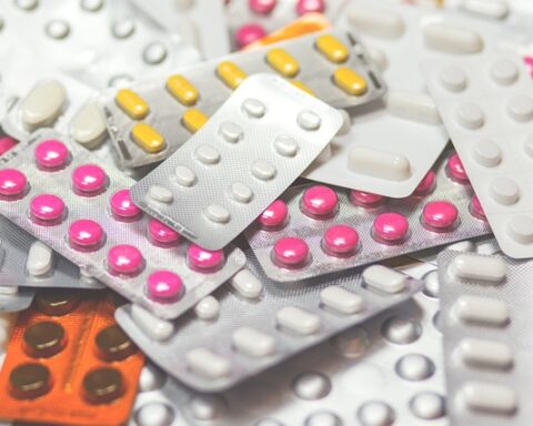 A variety of pills and tablets of different shapes and colors