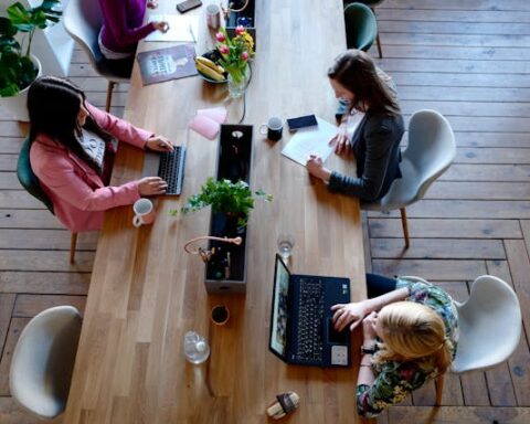 Reprentative Image. Three Woman Sitting on White Chair in Front of Table. Photo Source: Cowomen (Pexels)